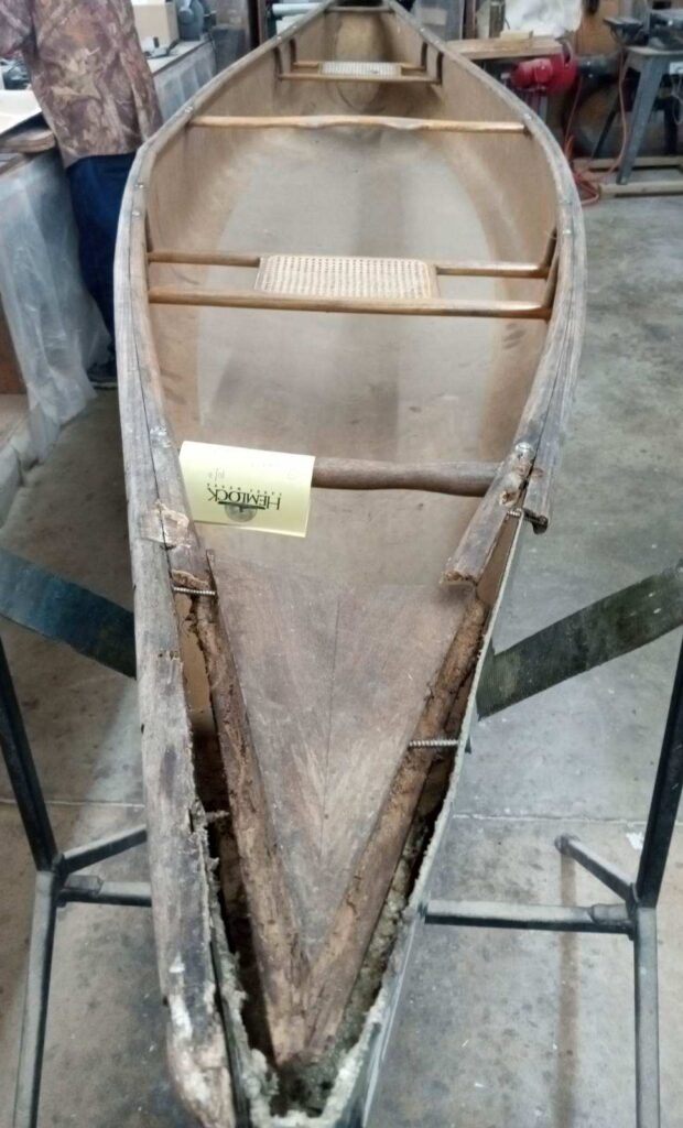 damaged canoe to be repaired